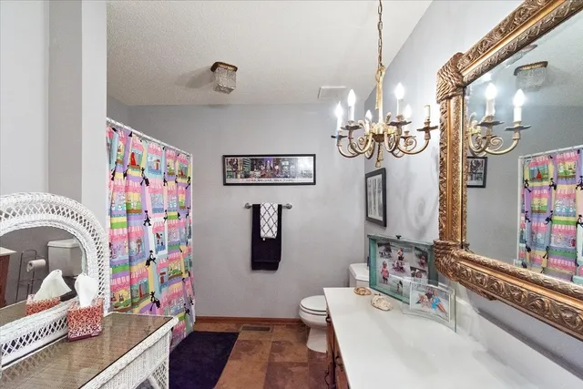 a bed room with a bed and a window