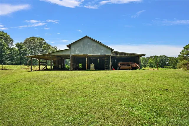 a view of a house with a big yard
