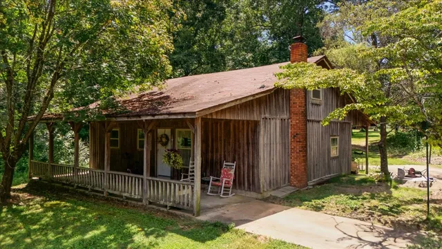 an aerial view of a house with a garden