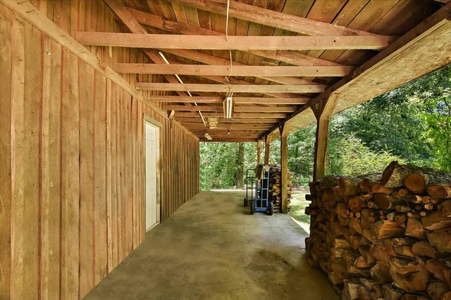 an aerial view of residential houses with yard