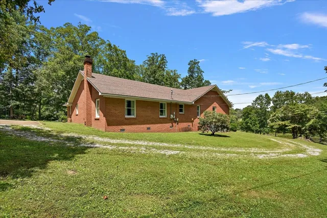 a view of a lake with a yard