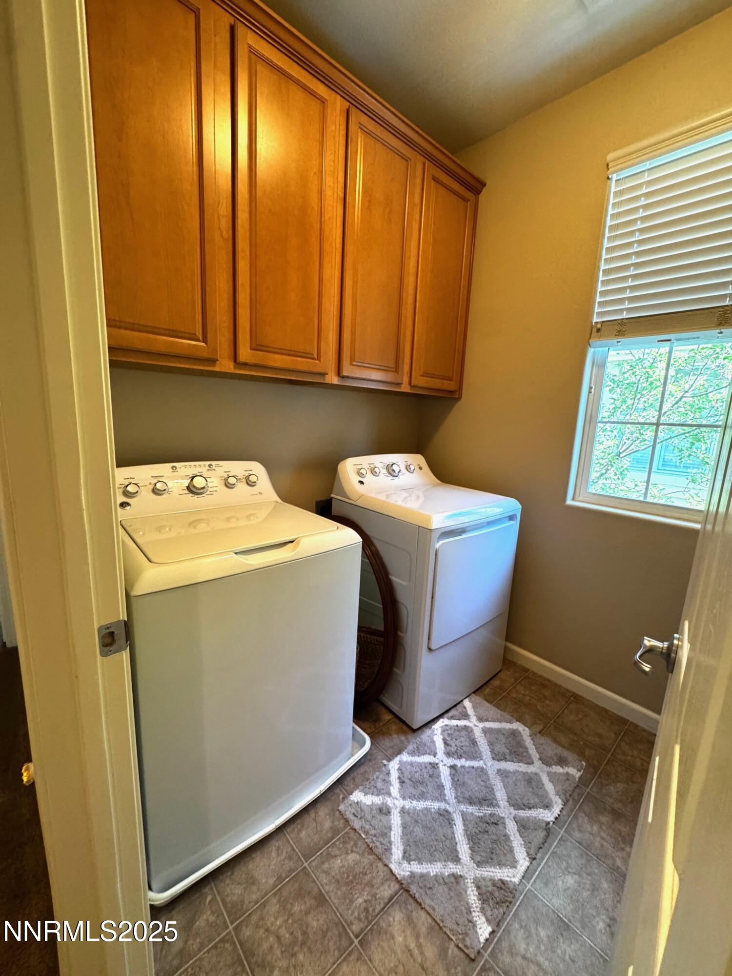 11044 Lamour Lane Reno, NV 89521 - Photo 16 of 21 a utility room with dryer and washer