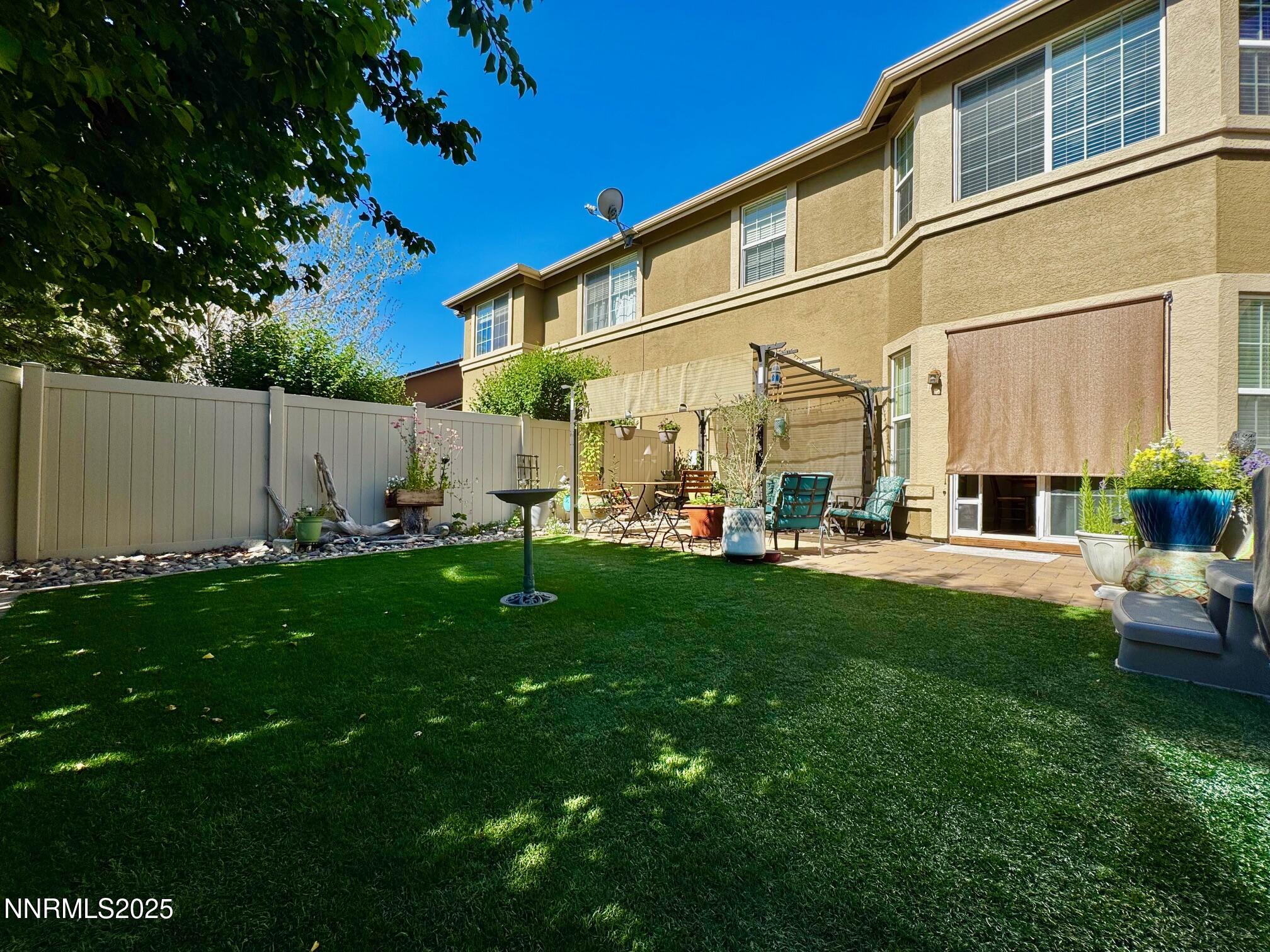 11044 Lamour Lane Reno, NV 89521 - Photo 18 of 21 a view of a back yard of the house with a big yard