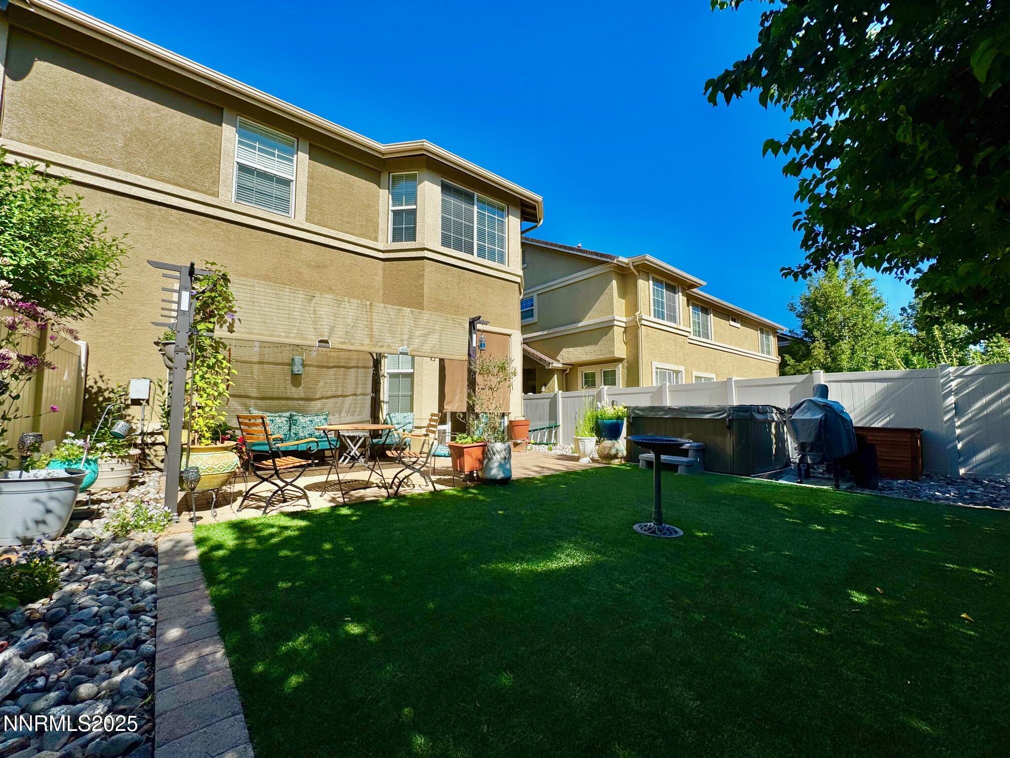 11044 Lamour Lane Reno, NV 89521 - Photo 20 of 21 a view of a house with a backyard