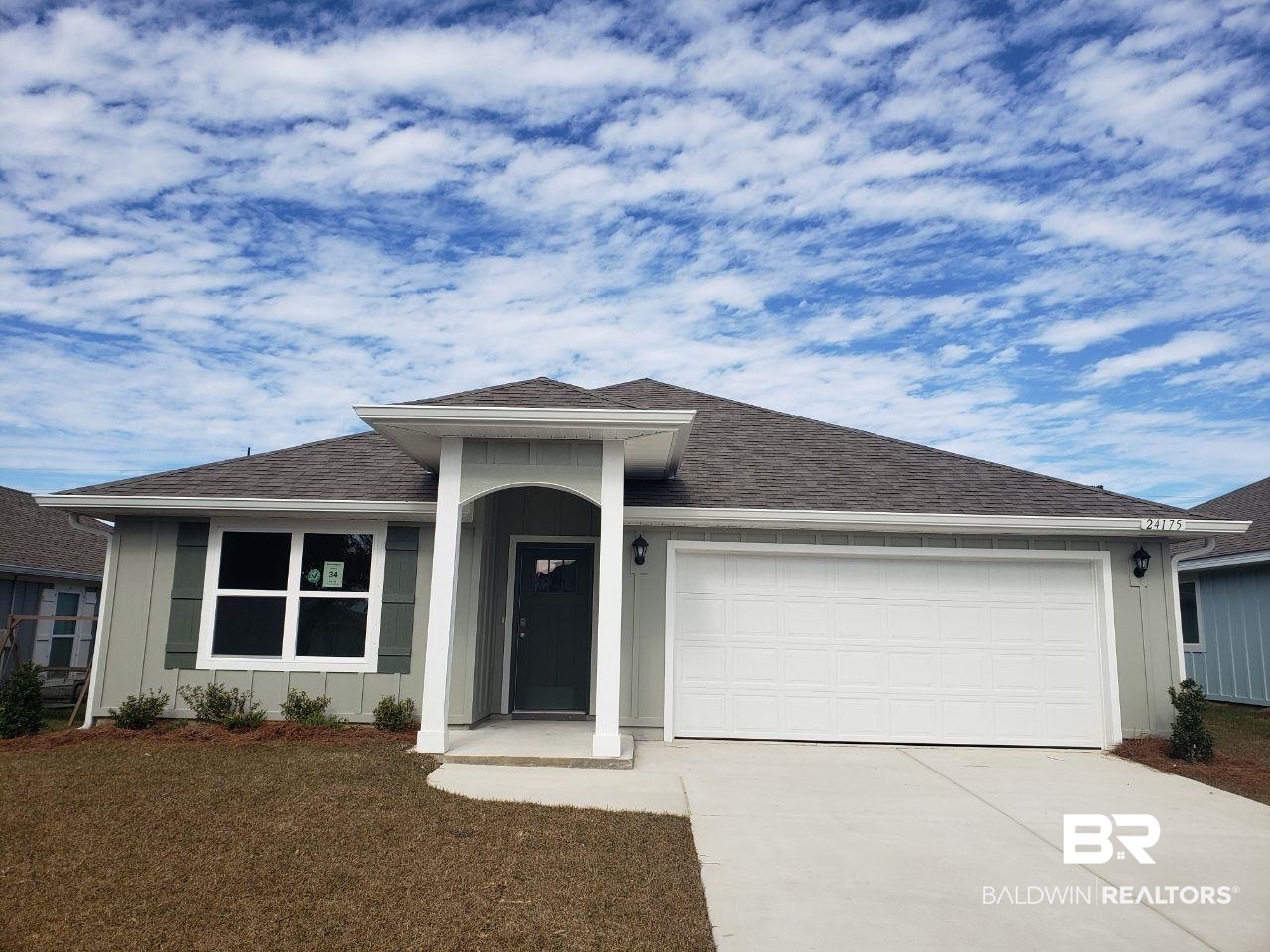 24175 Veranda Circle Elberta, AL 36530 - Photo 1 of 56 View of front of property with a garage and a front lawn