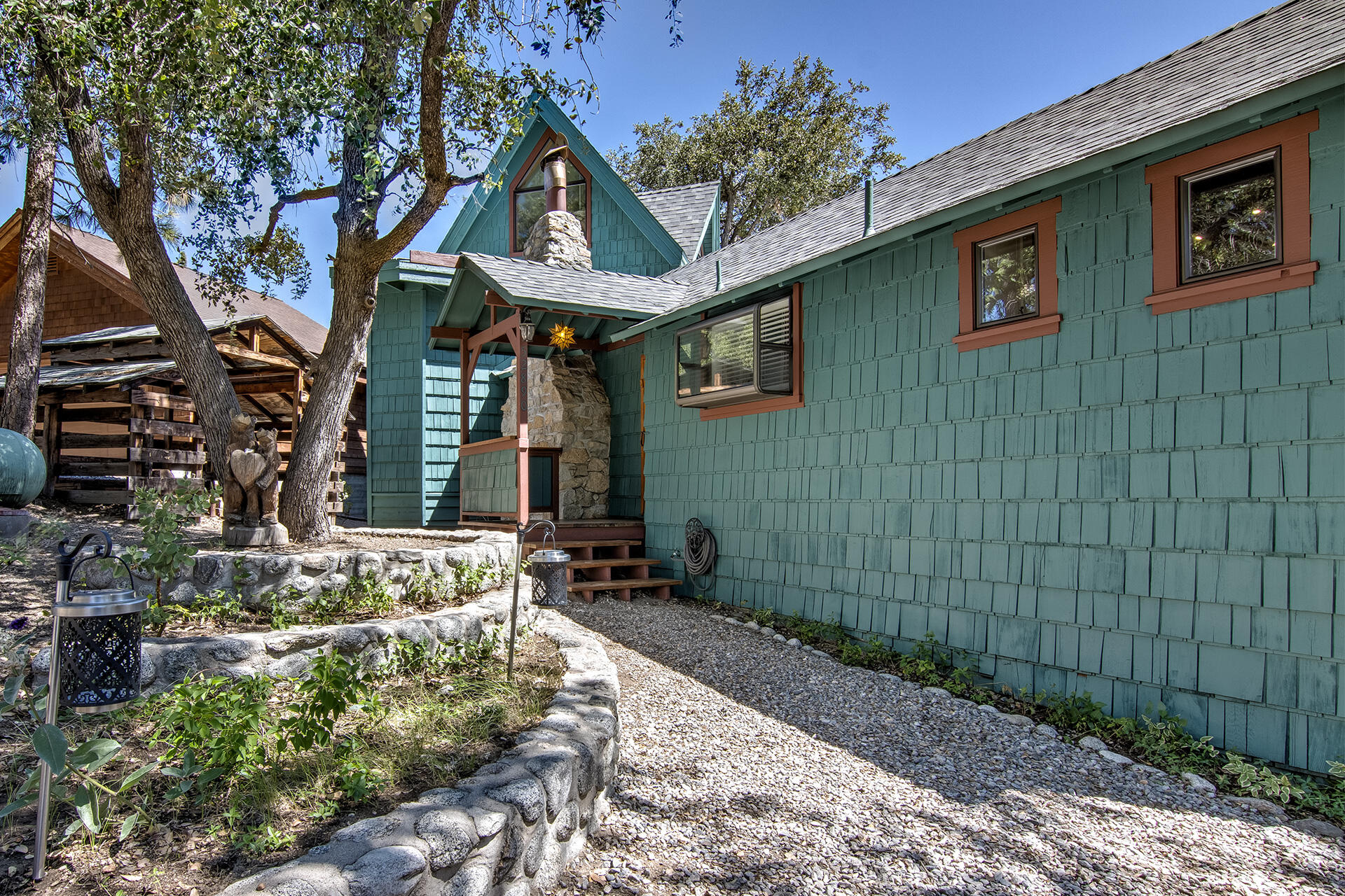 52890 Overlook Drive Idyllwild, CA 92549 - Photo 12 of 82 a front view of a house with garden