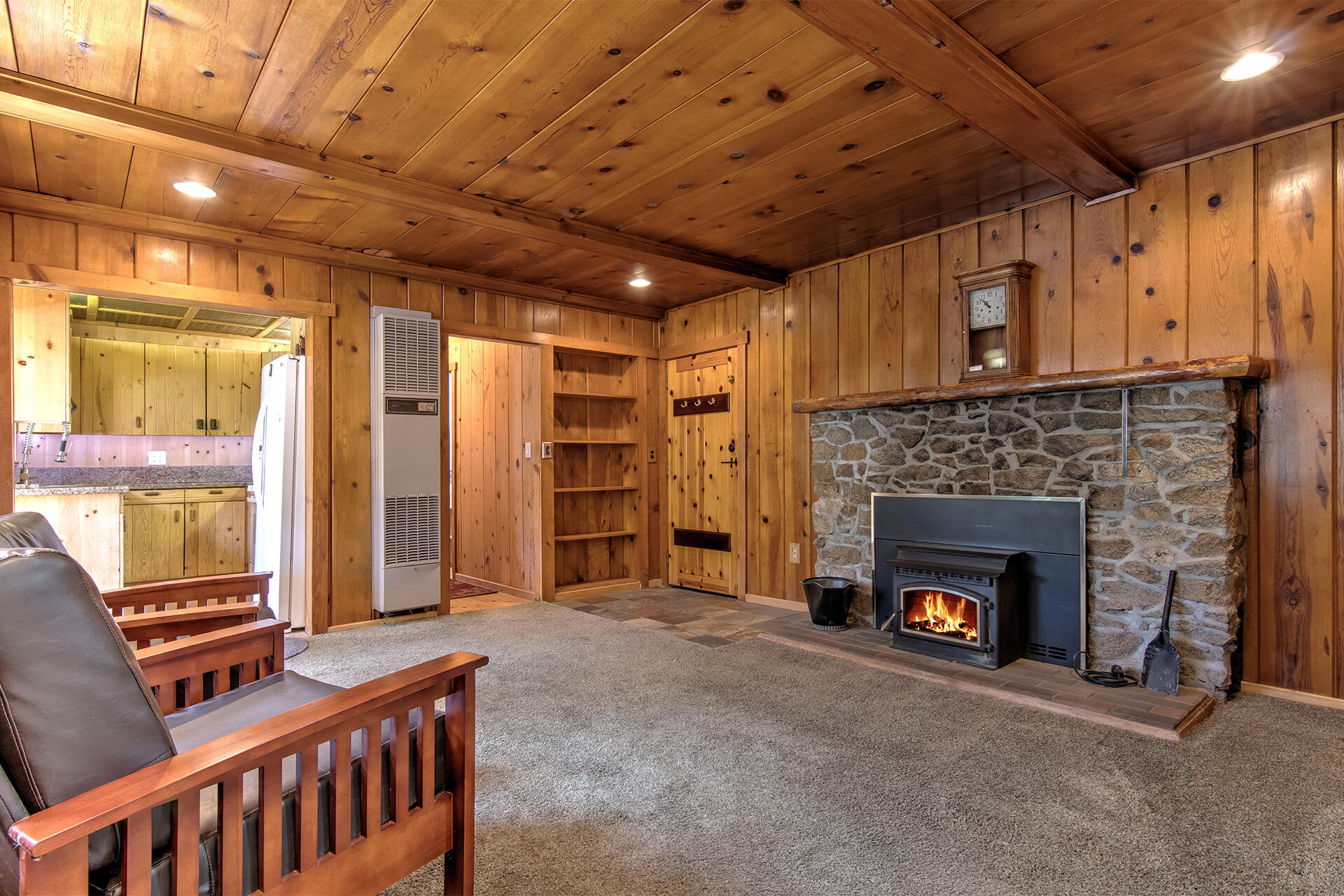 52890 Overlook Drive Idyllwild, CA 92549 - Photo 19 of 82 a living room with furniture a fireplace and a table