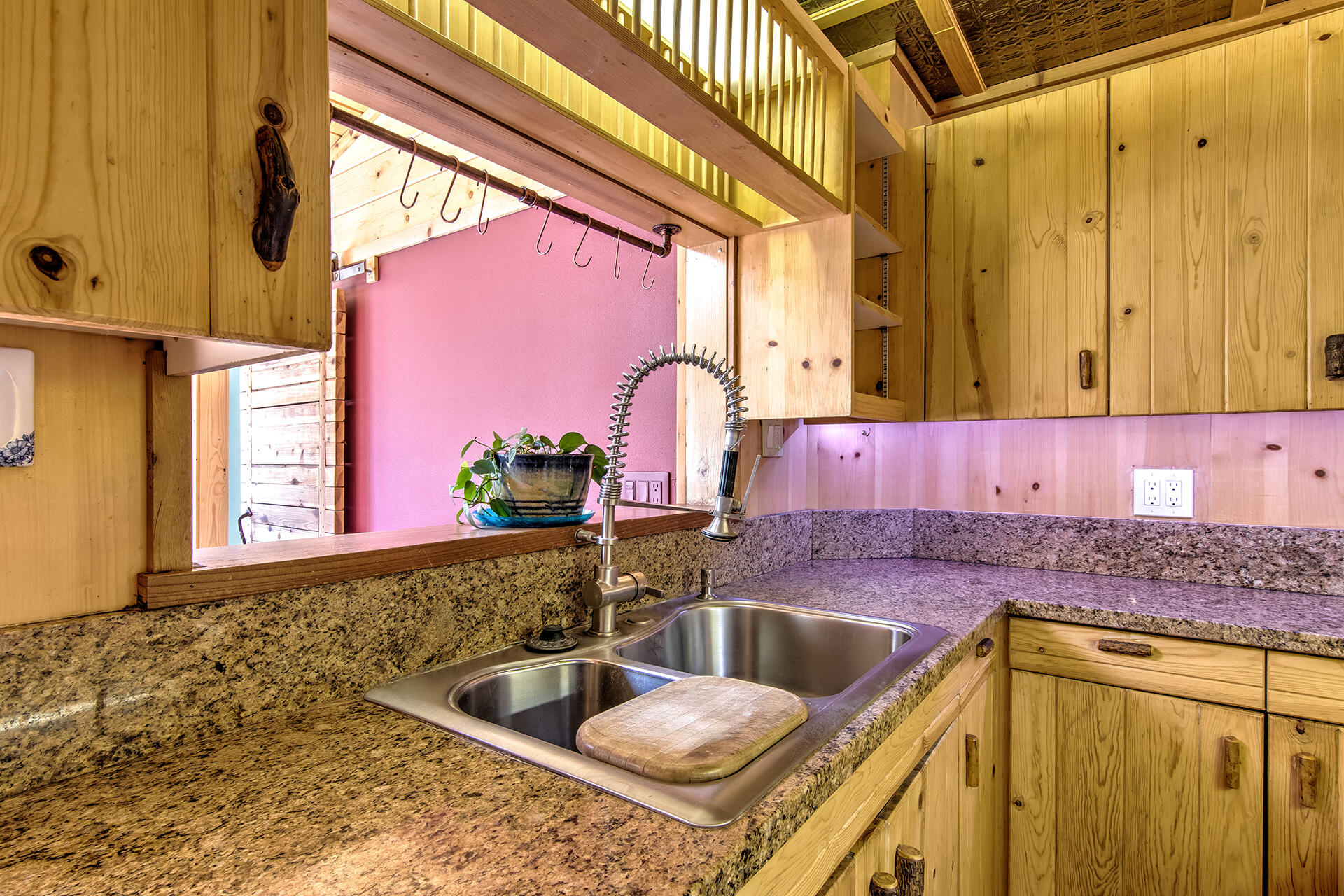 52890 Overlook Drive Idyllwild, CA 92549 - Photo 25 of 82 a kitchen with granite countertop a sink and a window