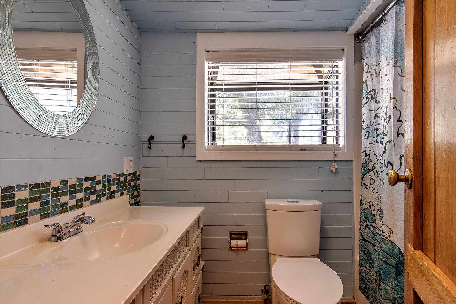 52890 Overlook Drive Idyllwild, CA 92549 - Photo 36 of 82 a bathroom with a sink a toilet and shower