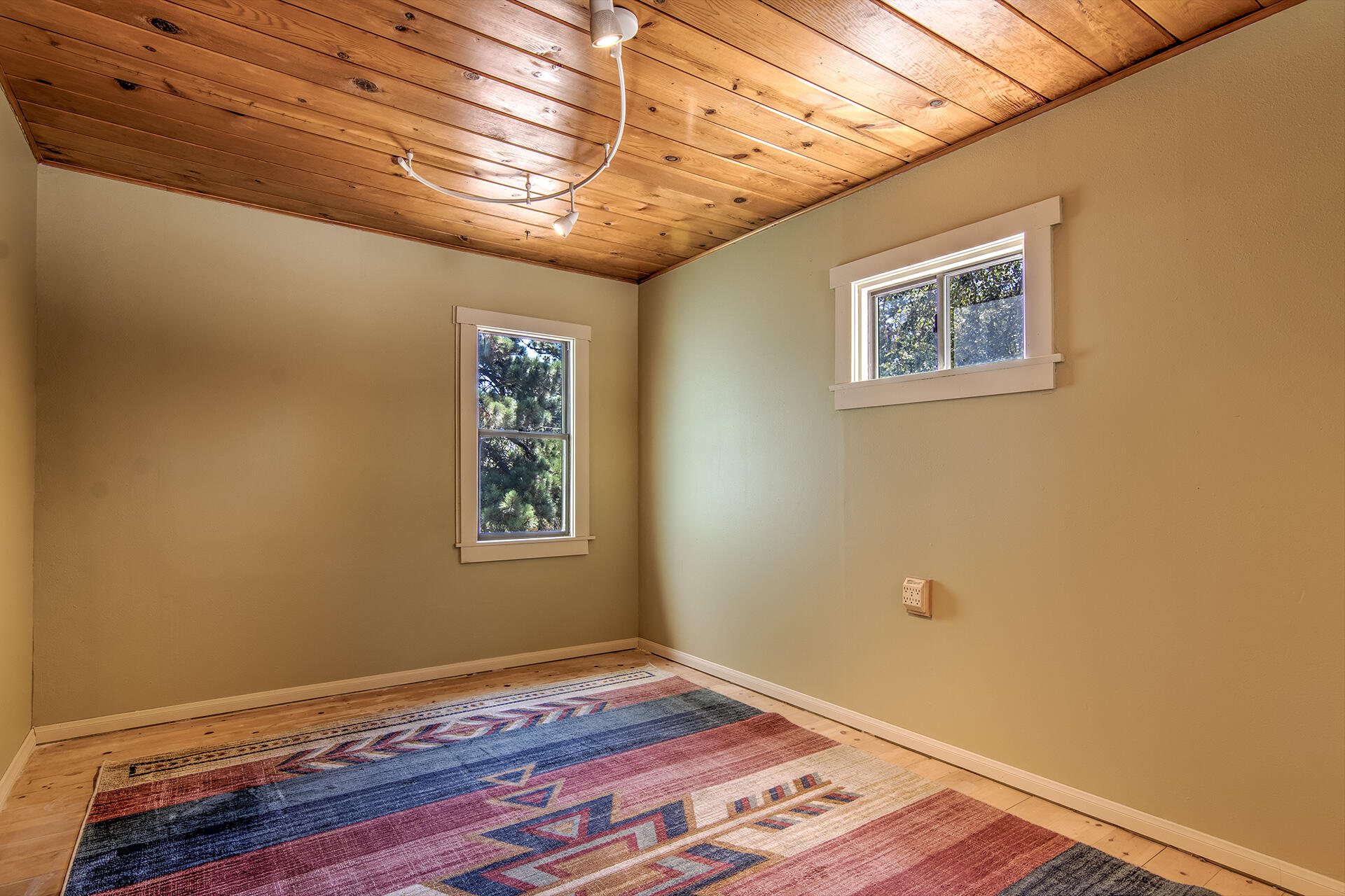 52890 Overlook Drive Idyllwild, CA 92549 - Photo 39 of 82 a view of a room with wooden floor and window