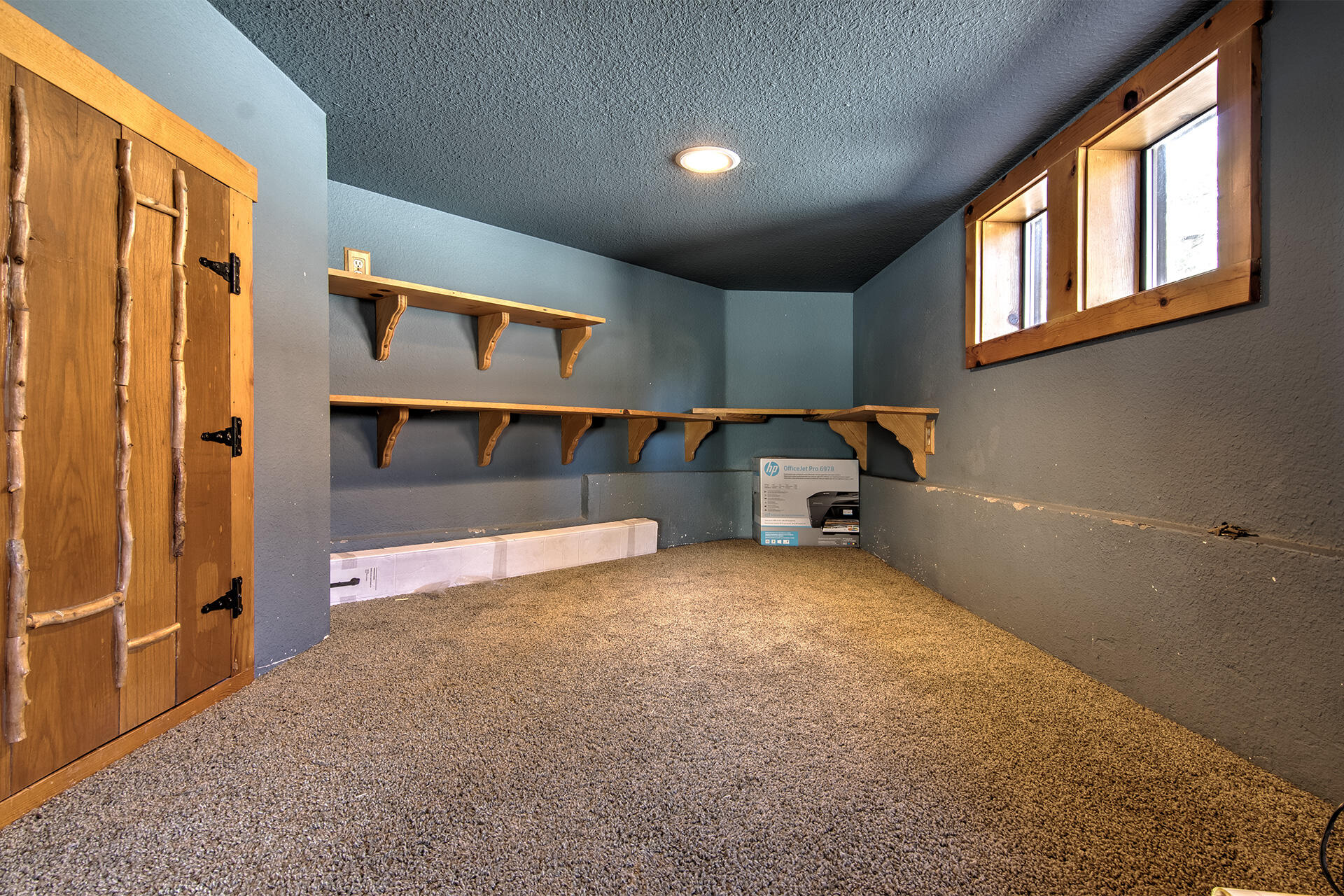 52890 Overlook Drive Idyllwild, CA 92549 - Photo 44 of 82 a view of an empty room with window and cabinet