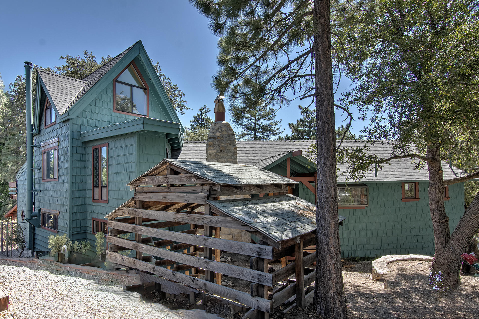 52890 Overlook Drive Idyllwild, CA 92549 - Photo 6 of 82 a front view of a house with garden