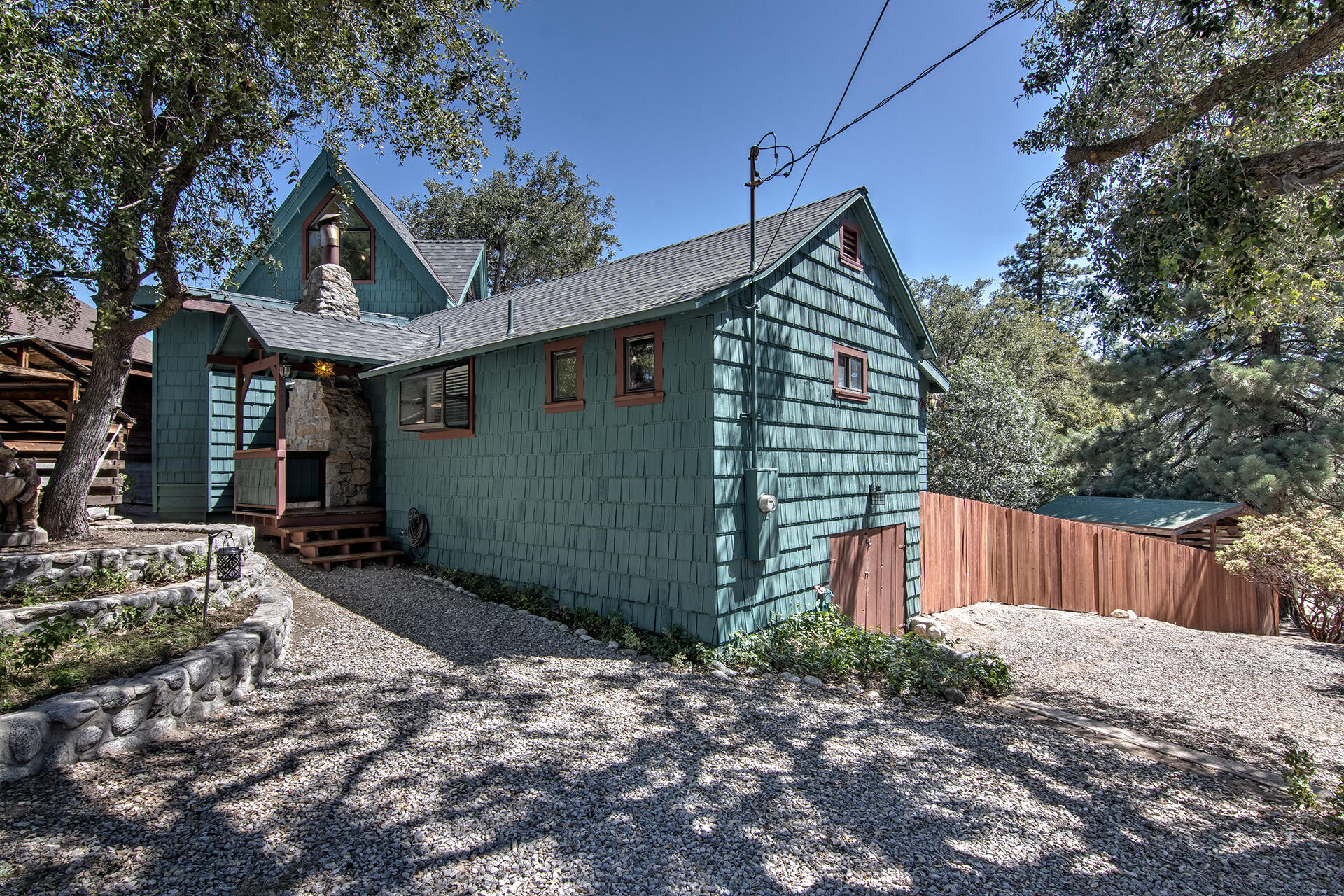 52890 Overlook Drive Idyllwild, CA 92549 - Photo 10 of 82 a front view of a house with garden