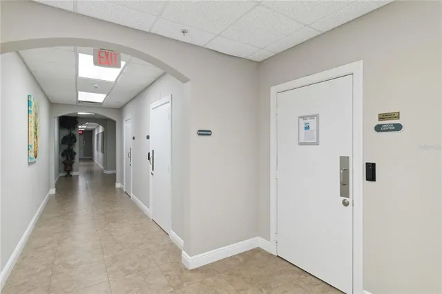 a kitchen with a sink stove and microwave