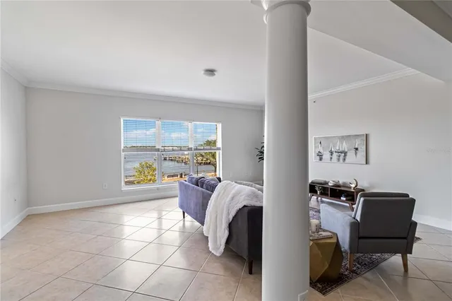 a living room with furniture and a table