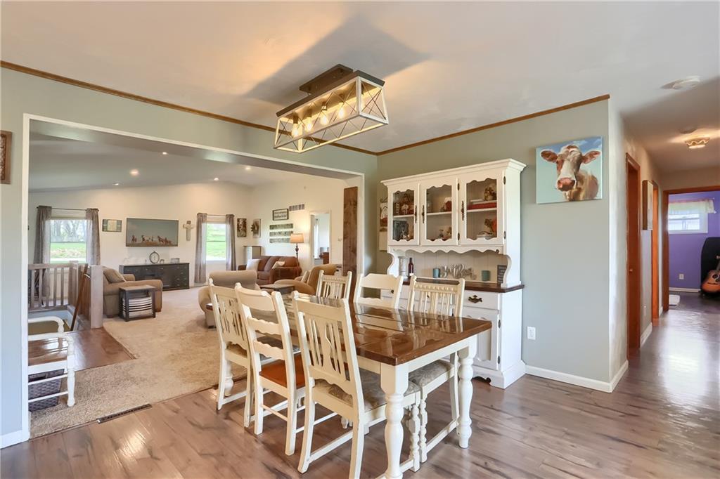 172 Bauder School Road Prospect, PA 16052 - Photo 6 of 25 a view of a dining room with furniture and wooden floor