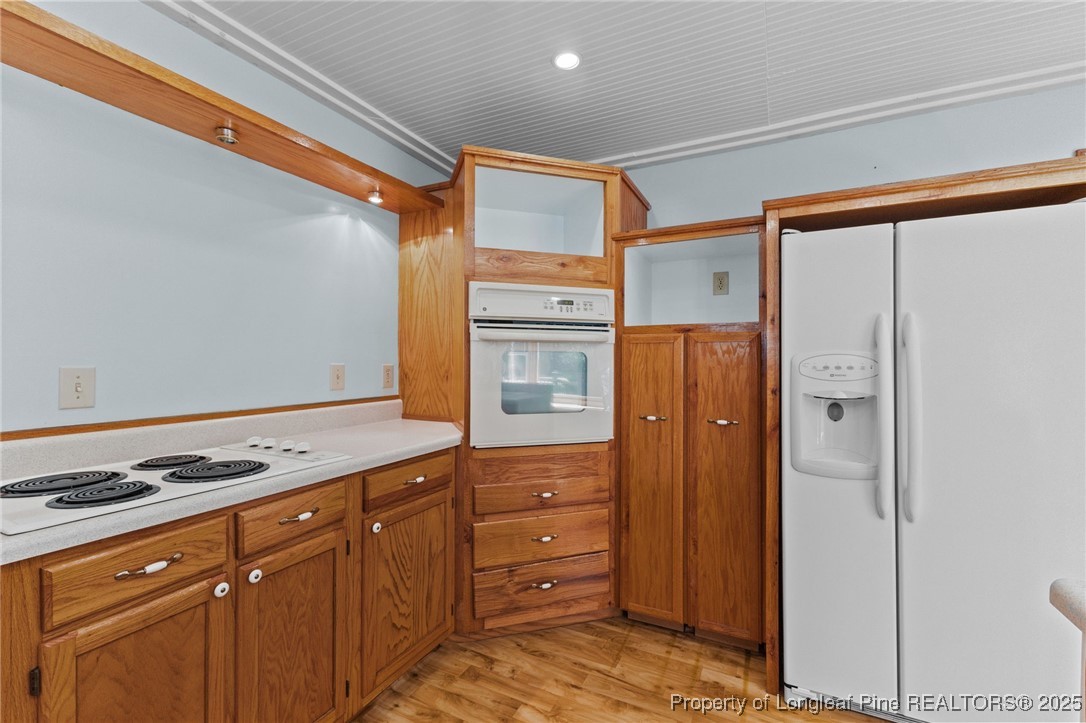 3560 School Road Fayetteville, NC 28306 - Photo 13 of 50 a kitchen with granite countertop cabinets and window