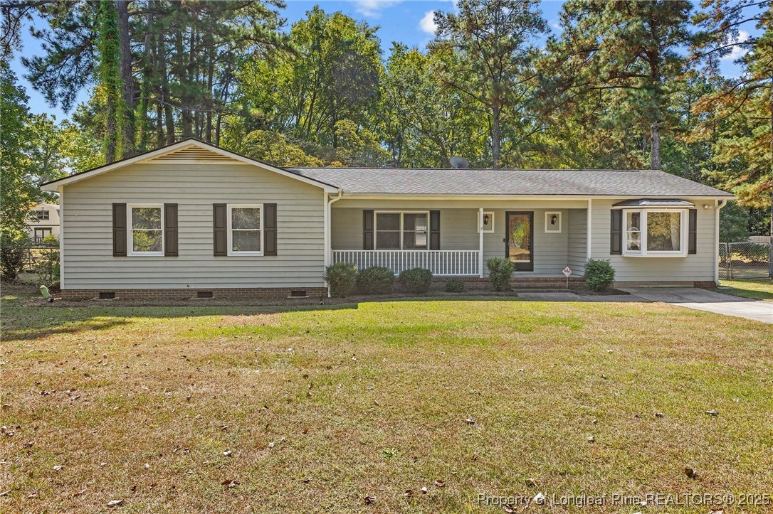 3560 School Road Fayetteville, NC 28306 - Photo 2 of 50 a front view of a house with yard