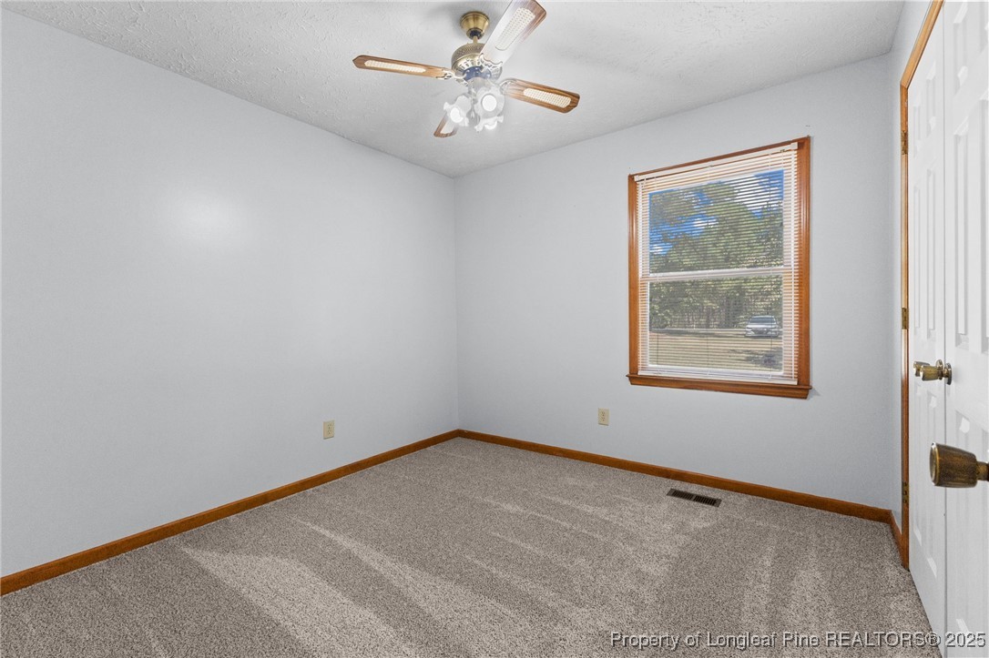 3560 School Road Fayetteville, NC 28306 - Photo 30 of 50 a view of an empty room with a window