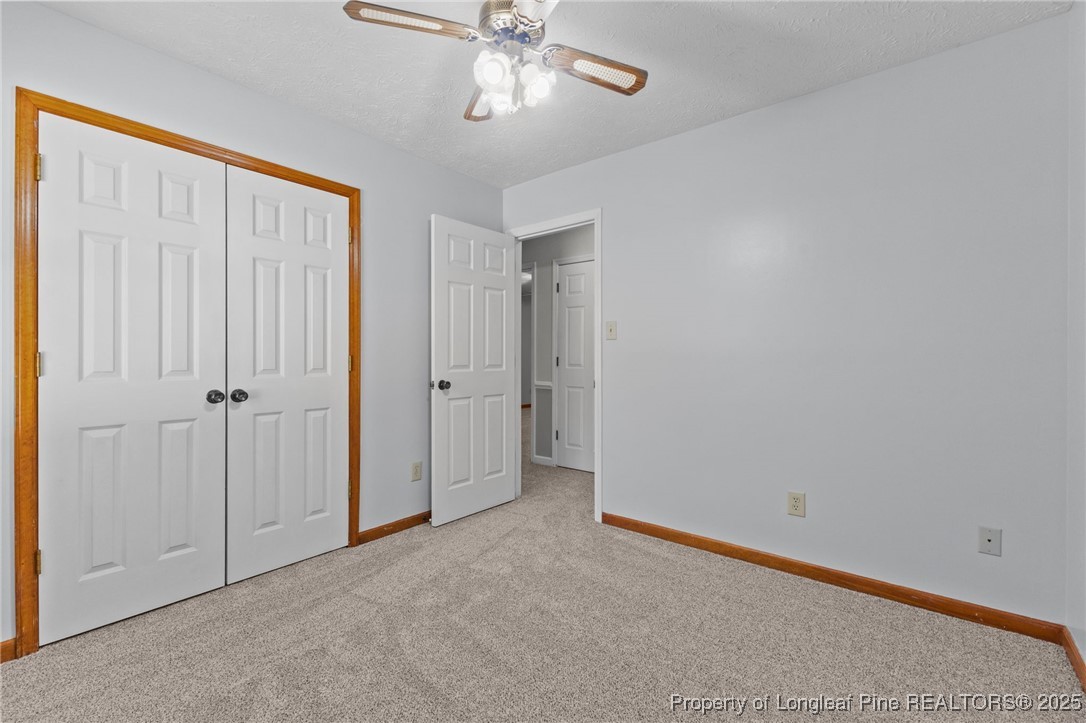 3560 School Road Fayetteville, NC 28306 - Photo 31 of 50 a view of an empty room and chandelier fan