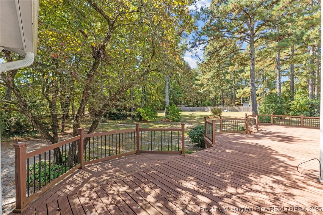 3560 School Road Fayetteville, NC 28306 - Photo 34 of 50 a view of a pathway with a wrought iron fence