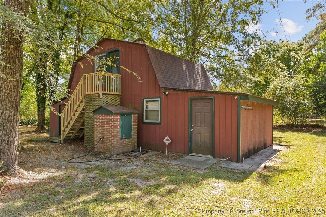 3560 School Road Fayetteville, NC 28306 - Photo 35 of 50 a view of a house with a yard