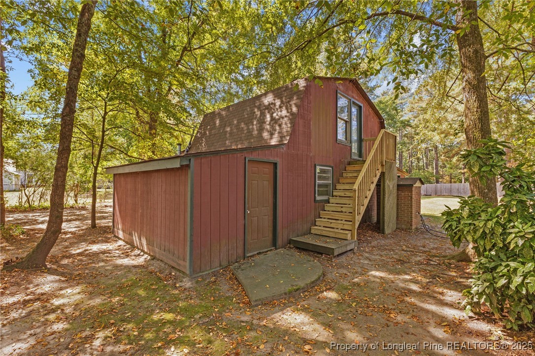 3560 School Road Fayetteville, NC 28306 - Photo 36 of 50 a view of a house with a yard