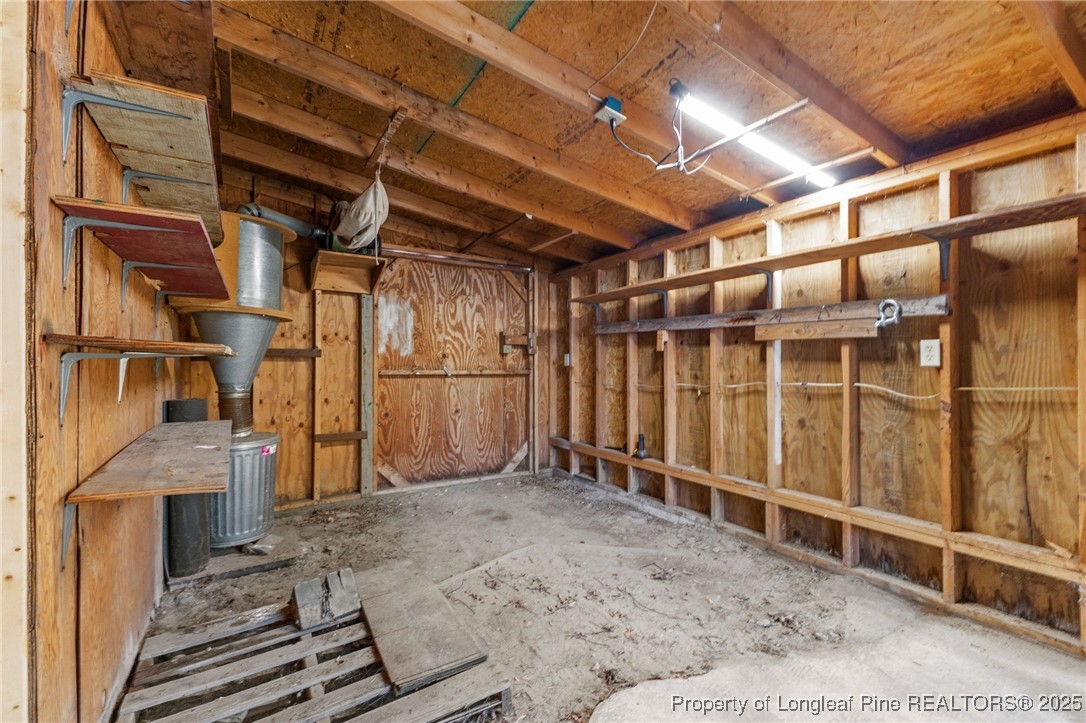 3560 School Road Fayetteville, NC 28306 - Photo 40 of 50 a view of an empty room with wooden walls