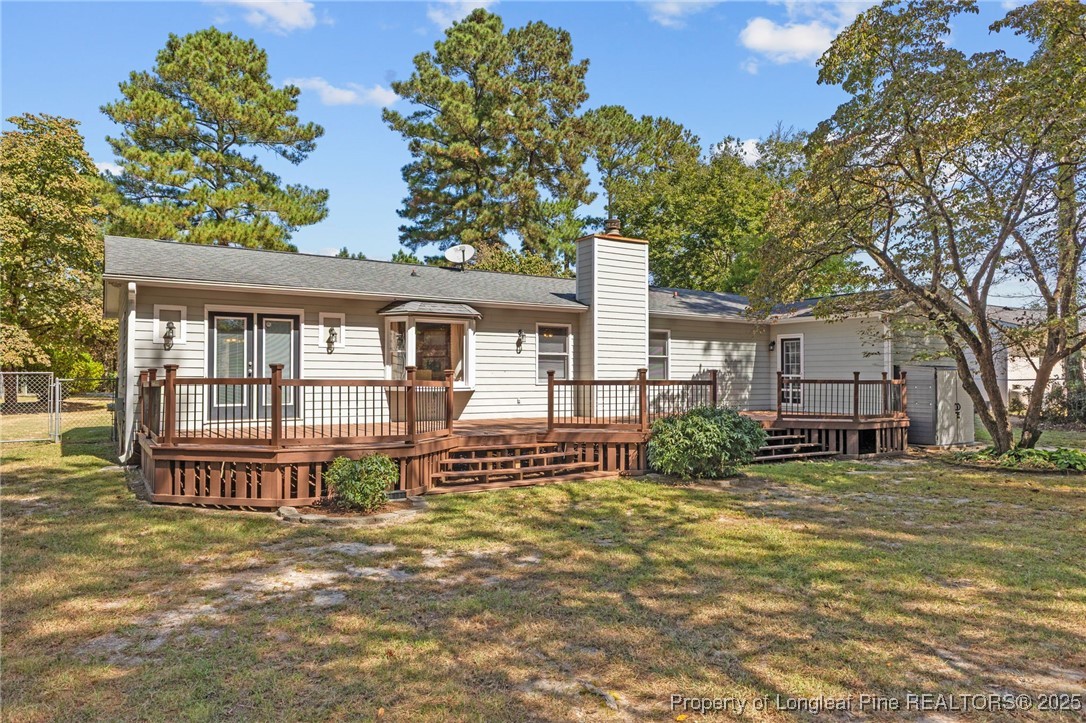 3560 School Road Fayetteville, NC 28306 - Photo 49 of 50 a view of a house with backyard porch and sitting area