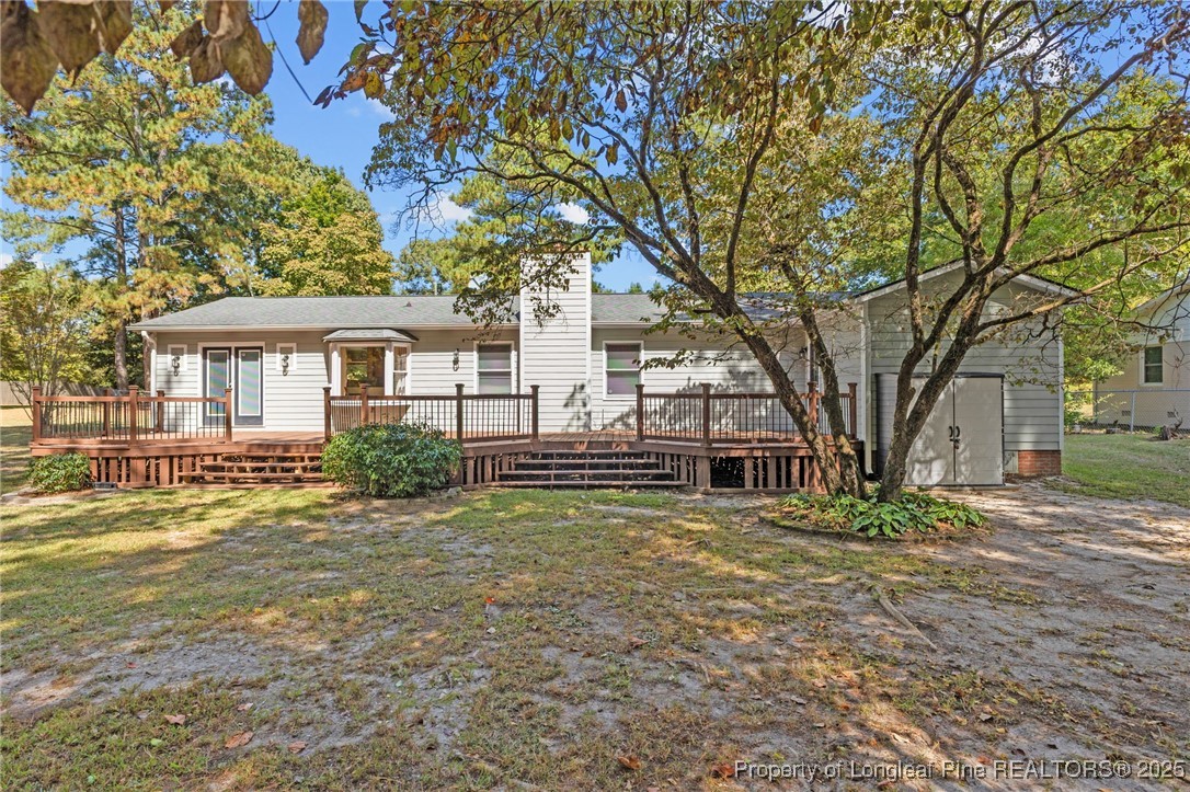 3560 School Road Fayetteville, NC 28306 - Photo 50 of 50 a front view of a house with a garden