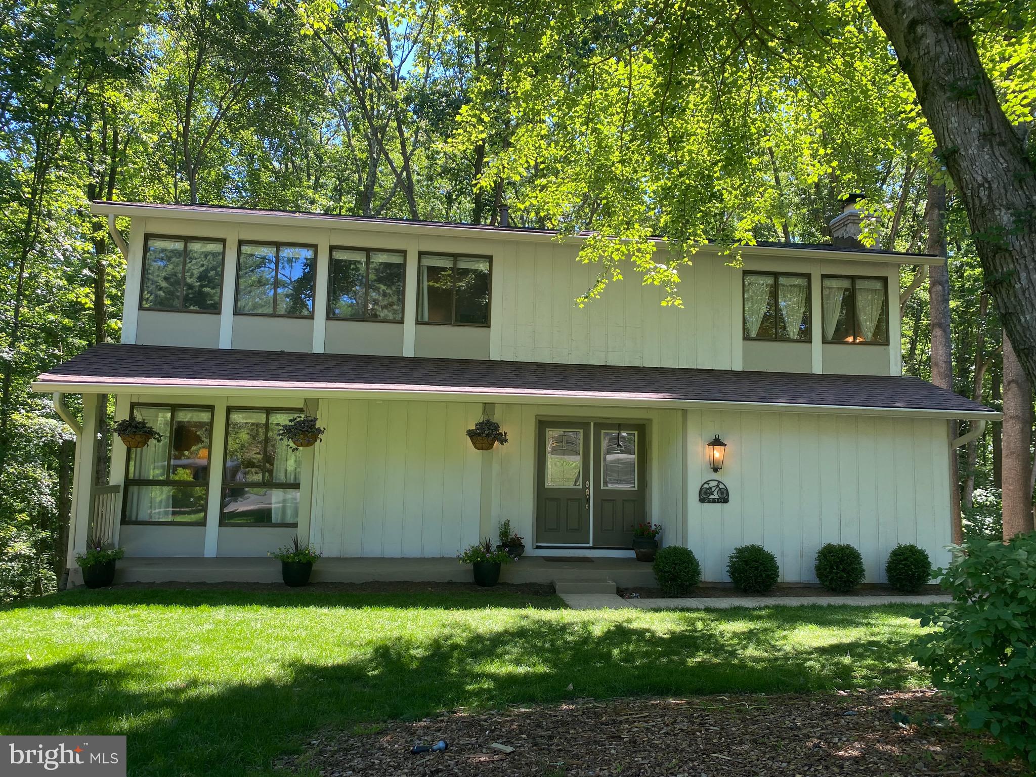 2119 Thomas View Road Reston, VA 20191 - Photo 1 of 41 a view of a house with backyard and garden