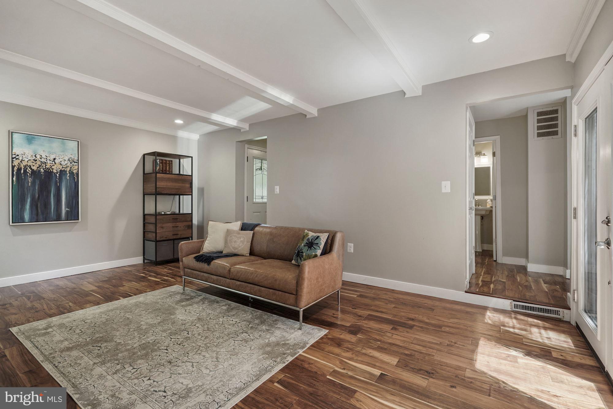 2119 Thomas View Road Reston, VA 20191 - Photo 17 of 41 a living room with furniture and a rug