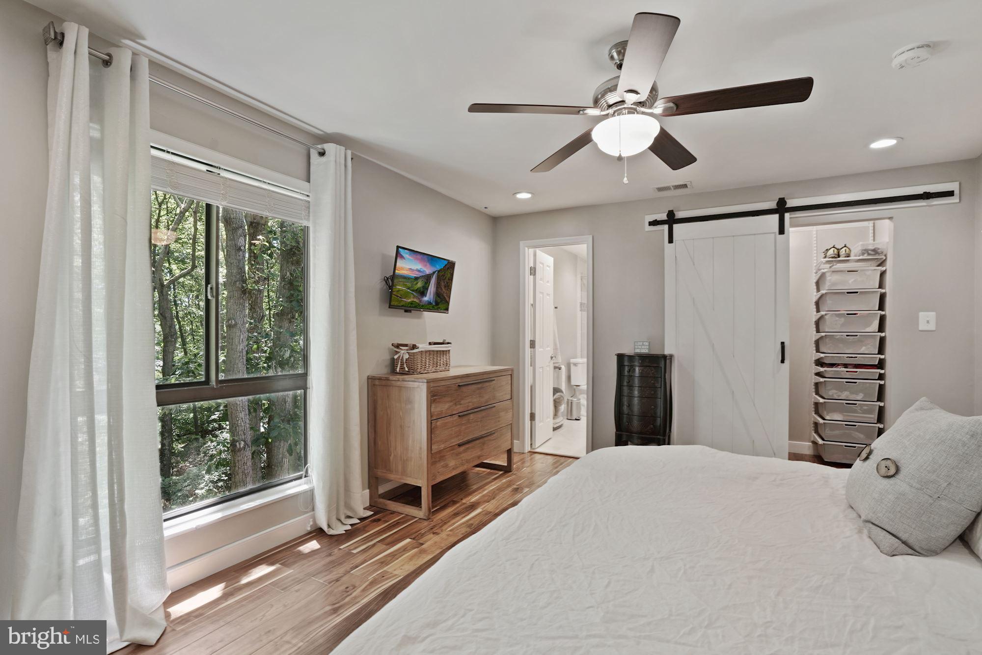 2119 Thomas View Road Reston, VA 20191 - Photo 21 of 41 a bedroom with a large bed and a window