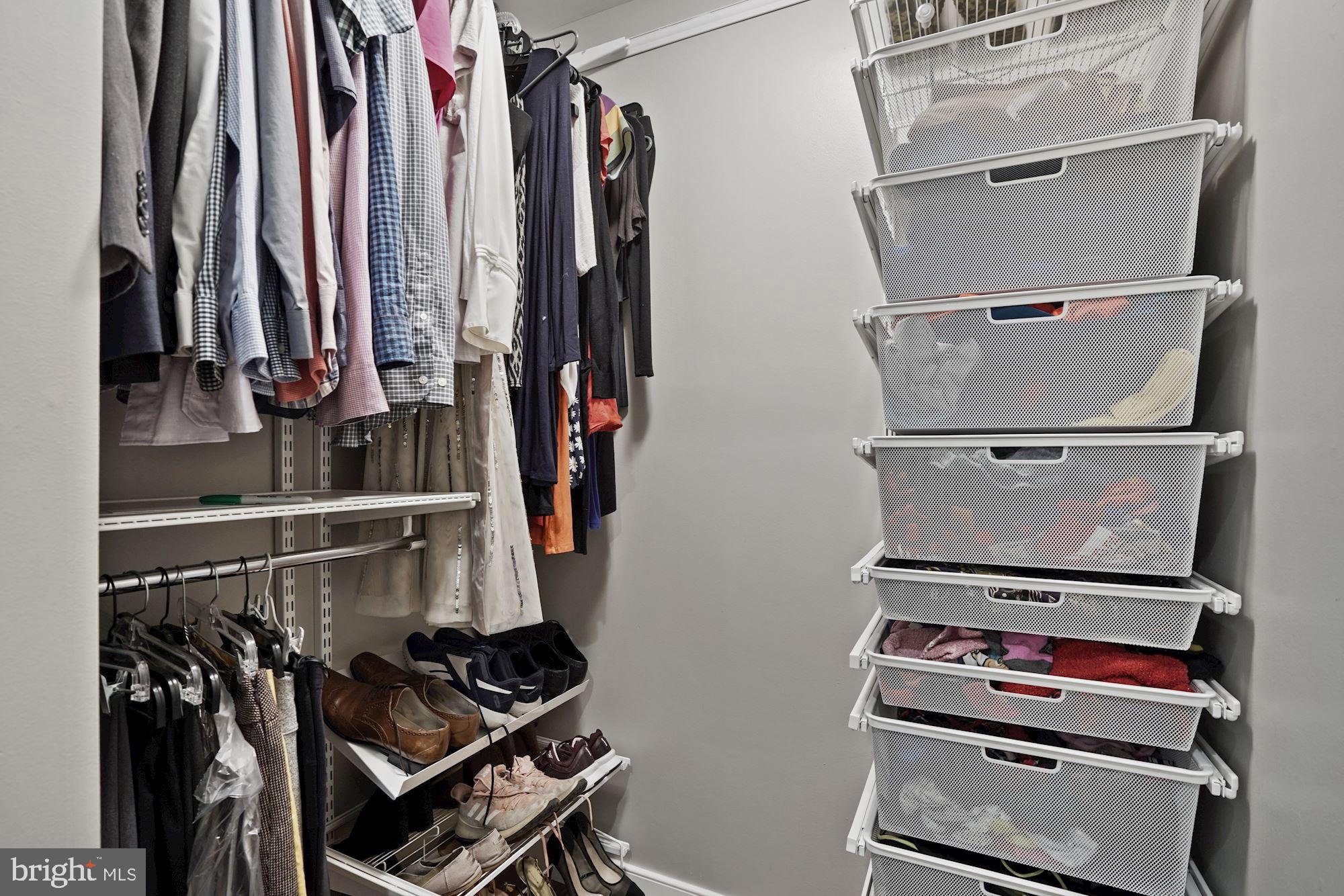 2119 Thomas View Road Reston, VA 20191 - Photo 23 of 41 a view of walk in closet with clothes and shoes