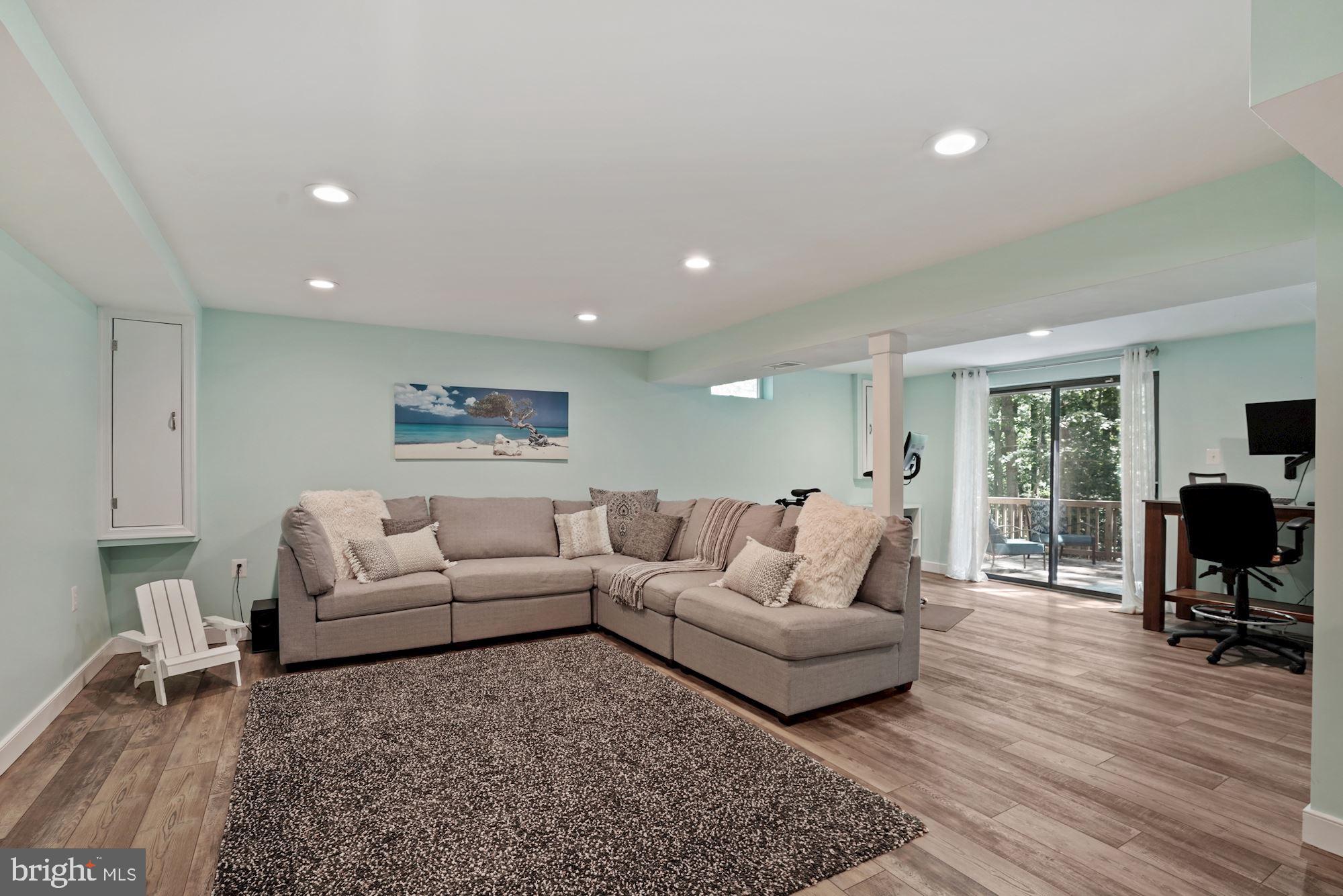2119 Thomas View Road Reston, VA 20191 - Photo 31 of 41 a living room with furniture and a fireplace