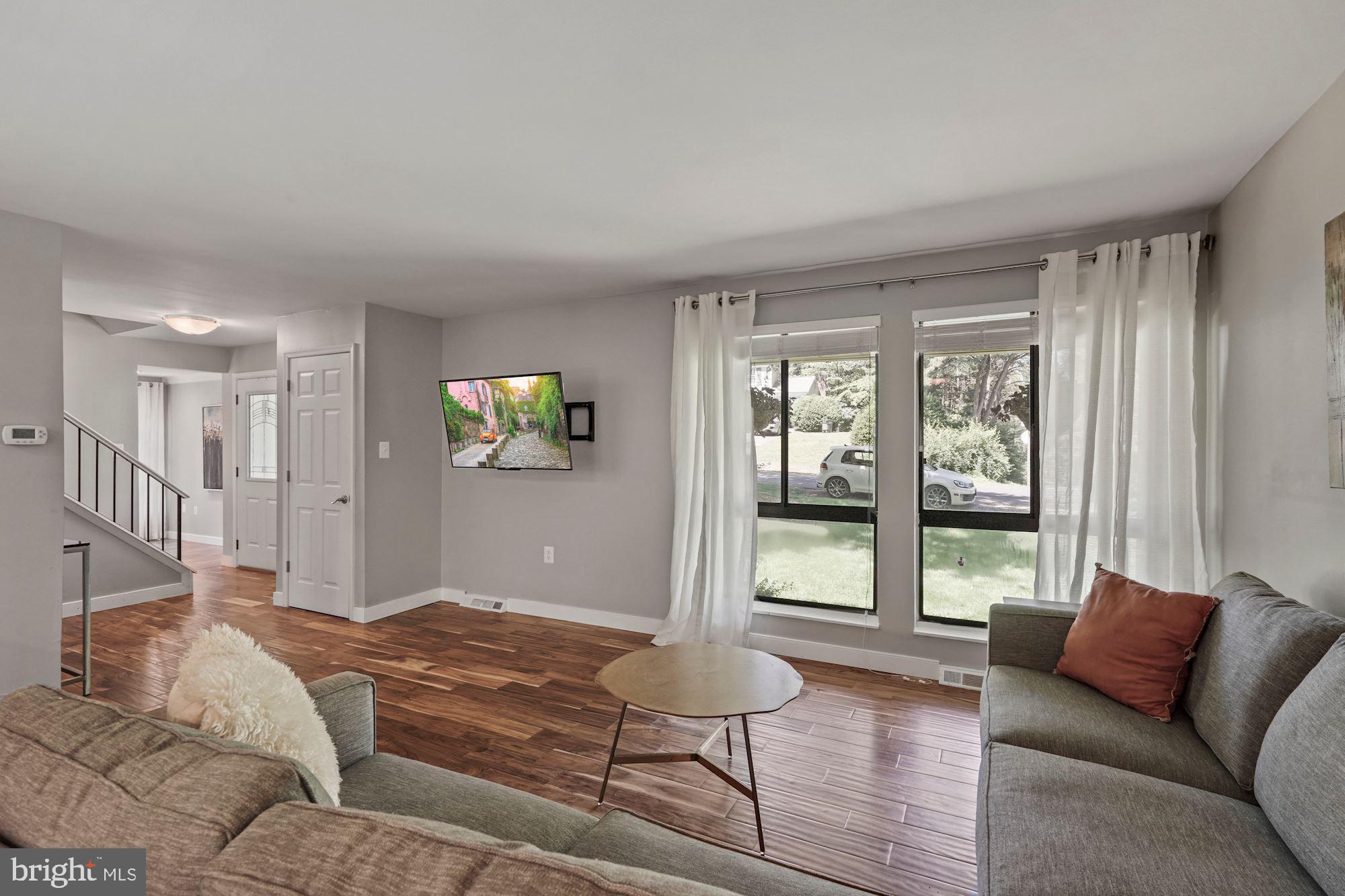 2119 Thomas View Road Reston, VA 20191 - Photo 6 of 41 a bedroom with furniture and a window