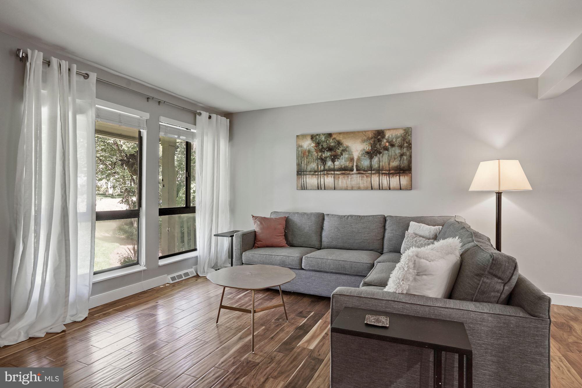 2119 Thomas View Road Reston, VA 20191 - Photo 7 of 41 a living room with furniture and a window