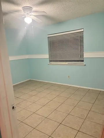 a view of a room with windows