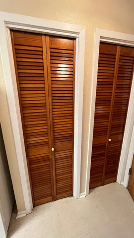 a view of a room that has a window in it