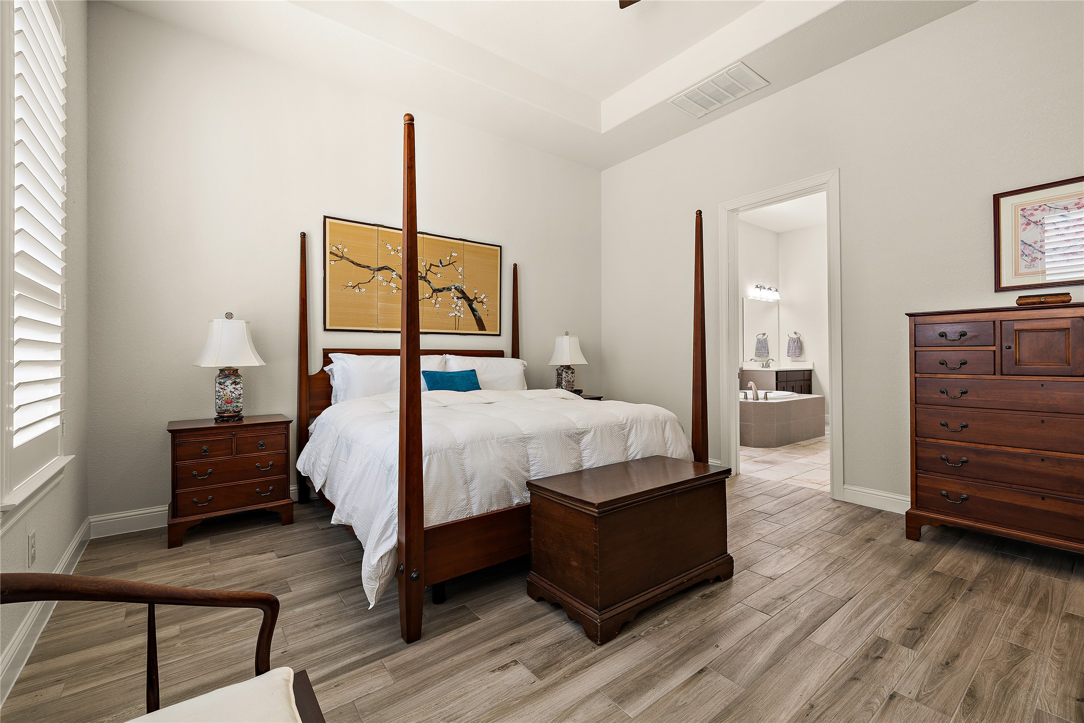 1716 Siena Sunset Road Leander, TX 78641 - Photo 17 of 28 The primary suite has its own ensuite and walk-in closet.