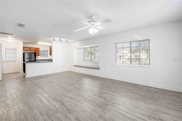 a view of a room with a large window