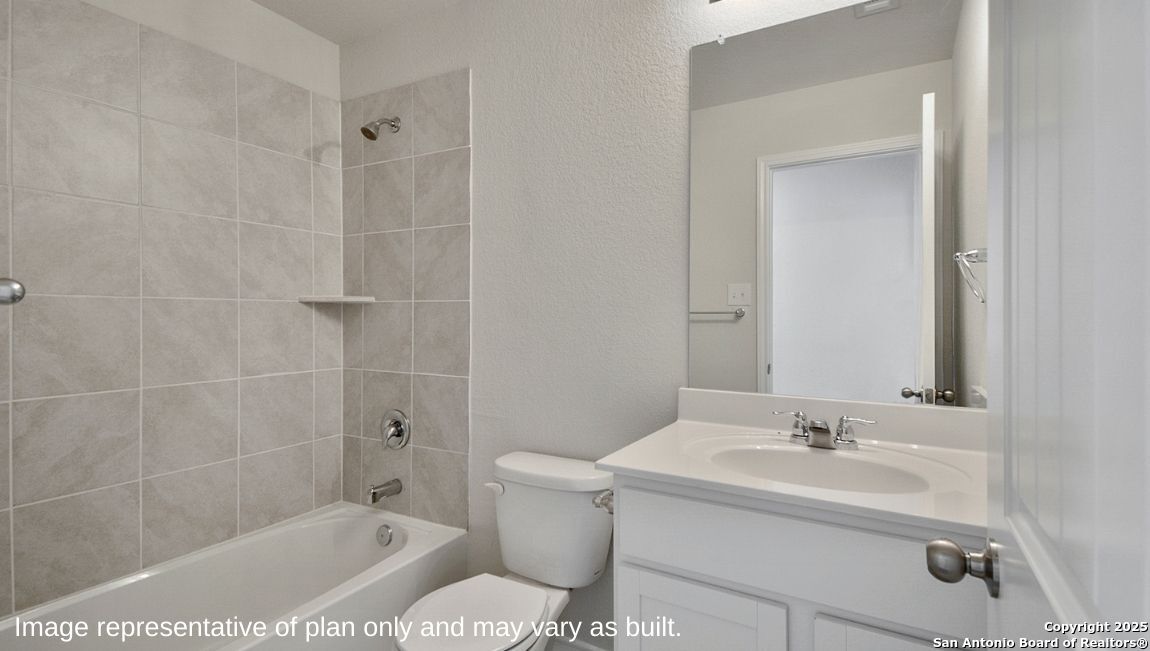 608 Fluted Shoals Cibolo, TX 78108 - Photo 14 of 36 a bathroom with a sink toilet and shower