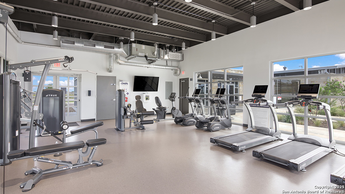 608 Fluted Shoals Cibolo, TX 78108 - Photo 29 of 36 a view of a room with gym equipment