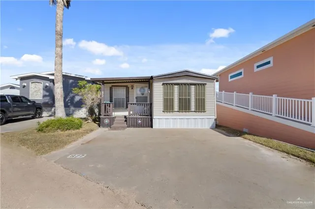 a house view with a garden space