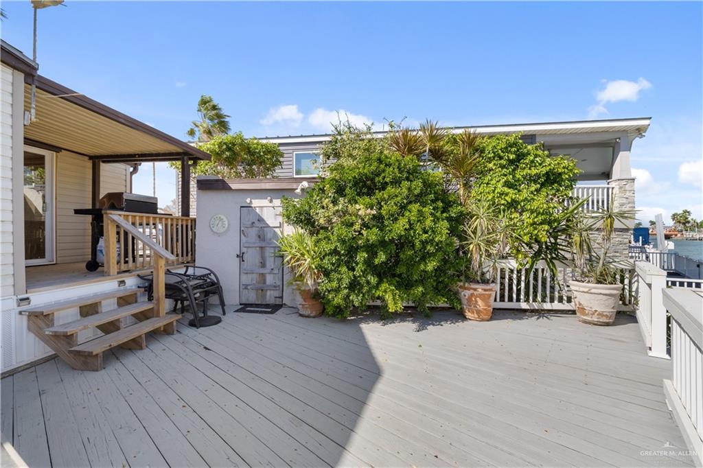 677 East Clam Circle Port Isabel, TX 78578 - Photo 20 of 27 a view of a house with a patio