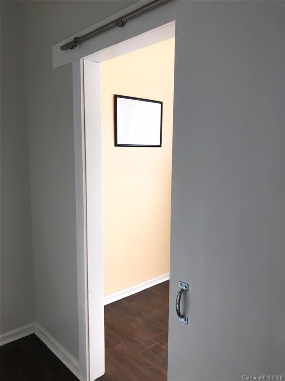709 Jones Branch Road Fort Mill, SC 29715 - Photo 7 of 25 a view of a small space with wooden floor and a window