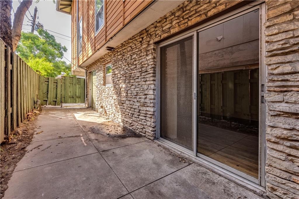 2800 Cole Street, Unit 107C Austin, TX 78705 - Photo 11 of 13 a view of a house with a outdoor space