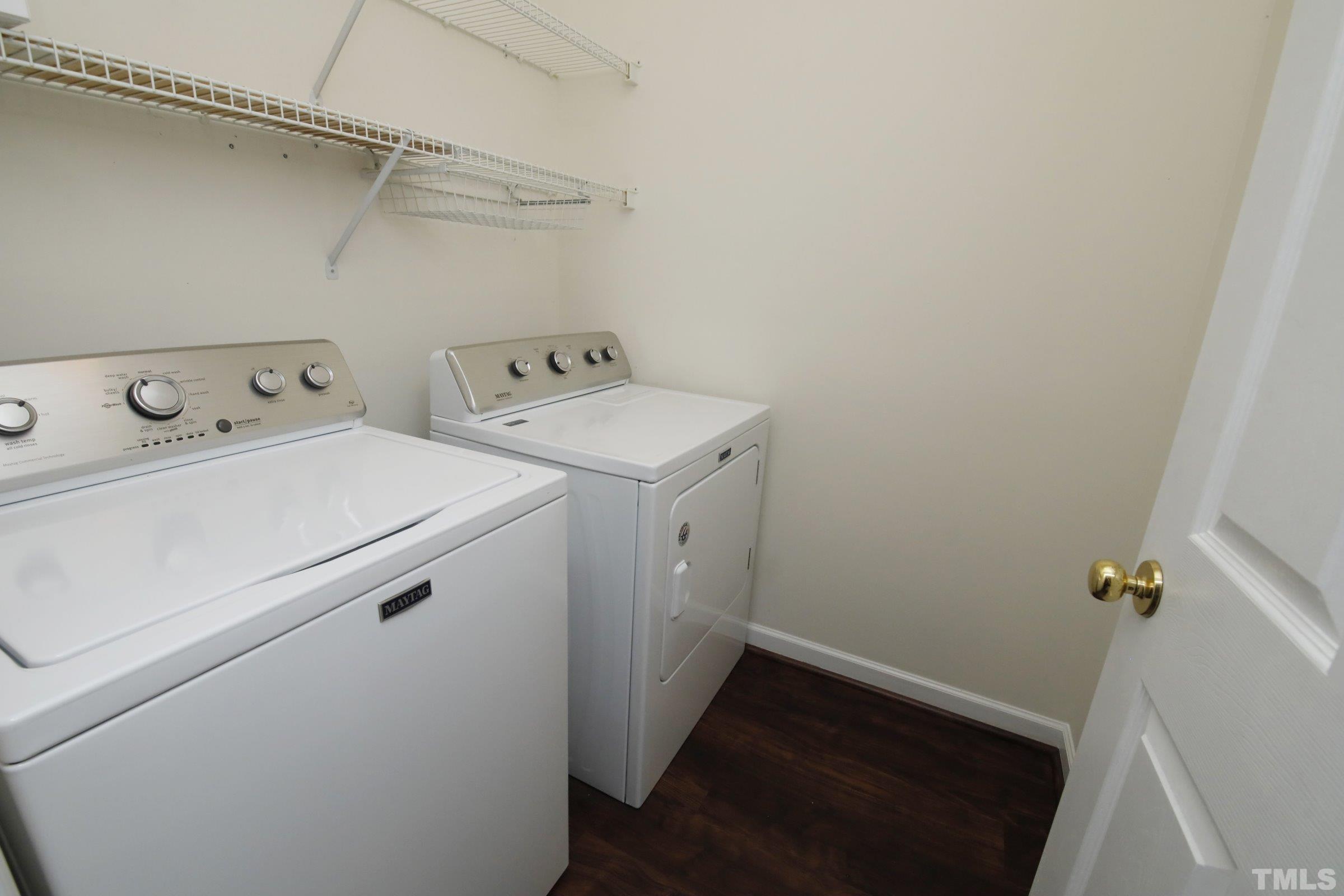 5633 Slide Rock Lane Raleigh, NC 27613 - Photo 16 of 32 a utility room with dryer and washer