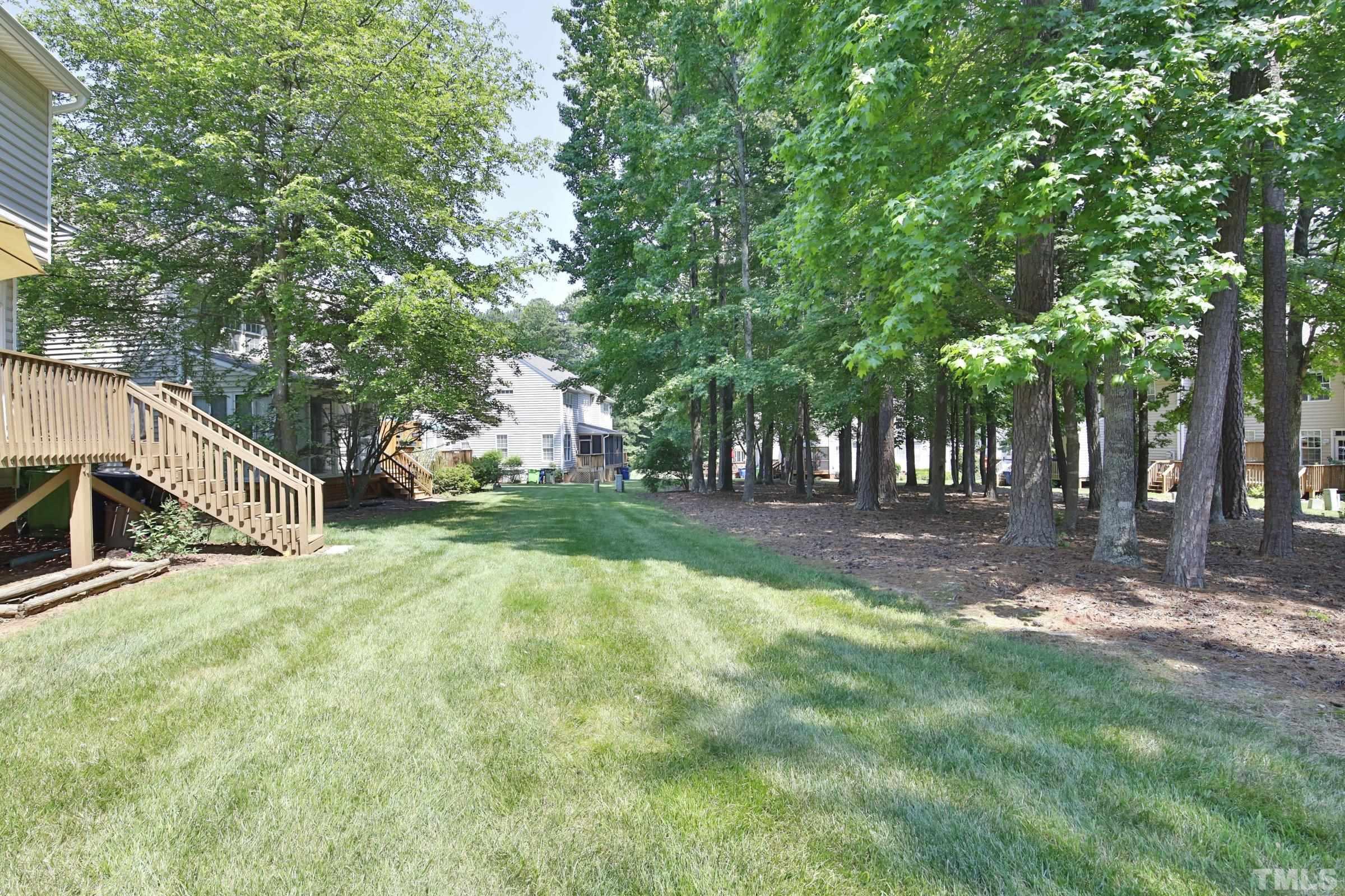 5633 Slide Rock Lane Raleigh, NC 27613 - Photo 28 of 32 a view of backyard with green space