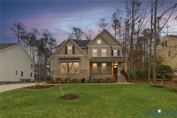 front view of a house with a yard